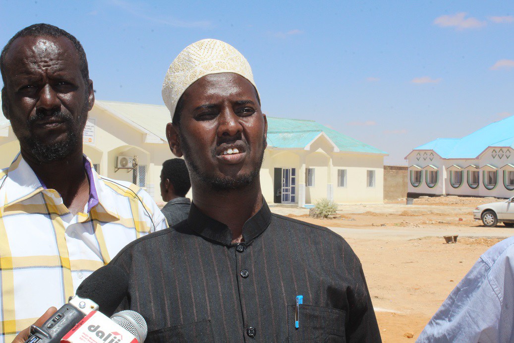 Hon. Mowlid Aw-Ahmed Yousuf speaking s to the media, after they carried out observation on CARE's planting work in Garowe. [Photo Credit: Puntland Post]
