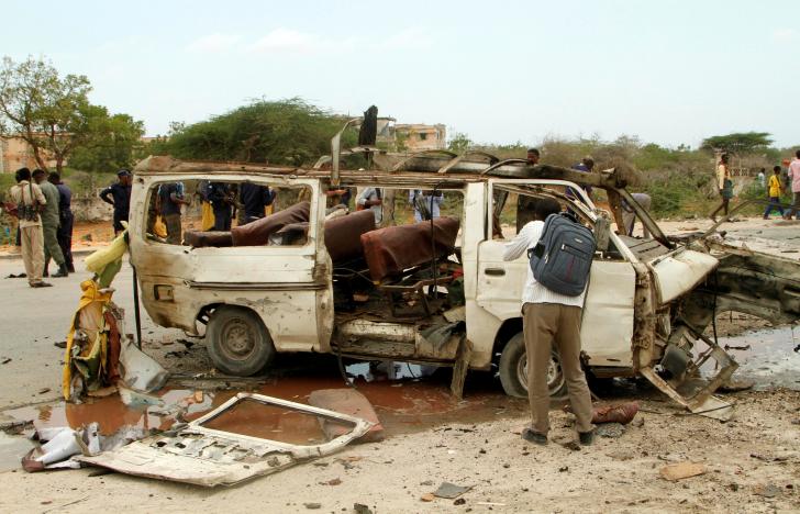 Wreckage of a minibus is seen at the scene of an explosion near a military base in Somalia’s capital Mogadishu
